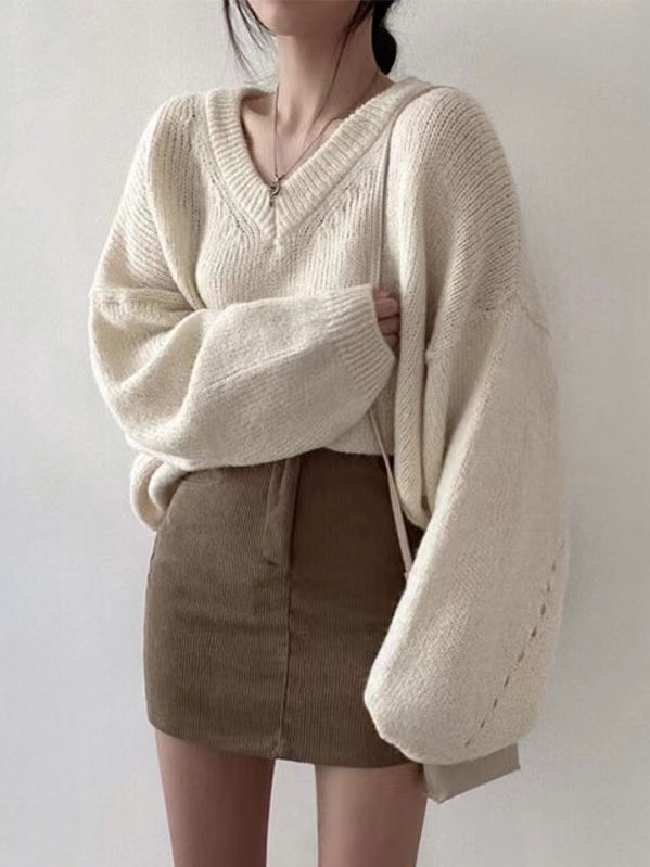 Pullover für Damen mit einem V-Ausschnitt aus Strick