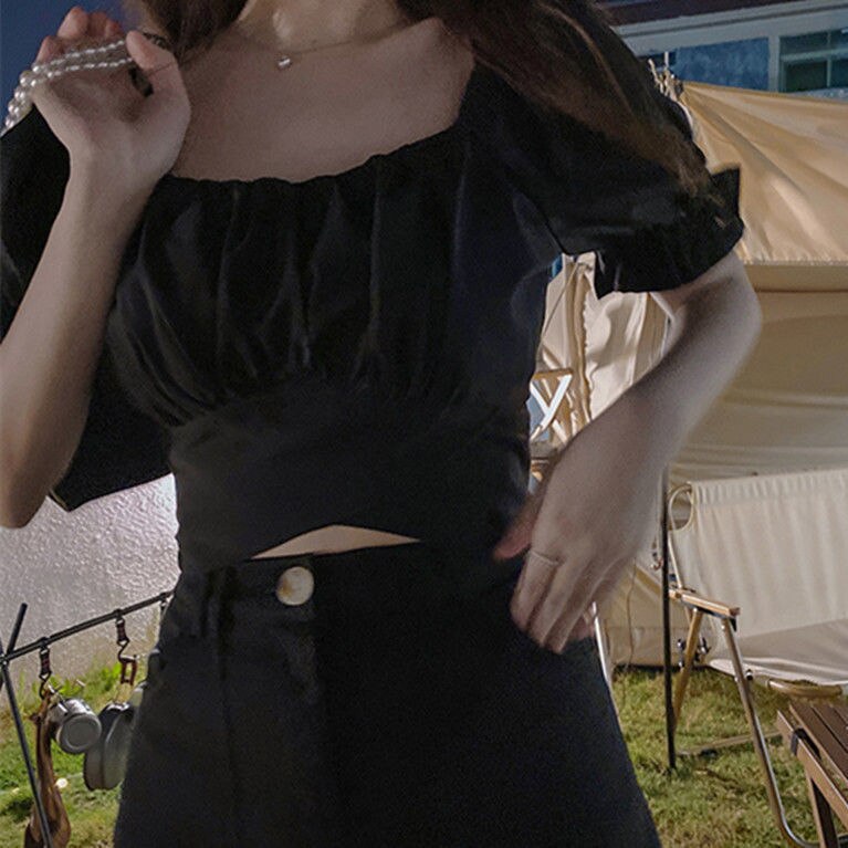 Bluse mit einer gebundenen Schleife auf dem Rücken - Andrea