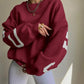 Clarissa | Lässiges Sweatshirt mit Buchstabenmuster