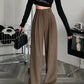 Schwarze weite Freizeithose mit Knopfdetails - Mia