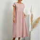 BENTE | ELEGANTES KLEID MIT TASCHEN