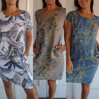 Eva - Weißes Midikleid mit Blättern