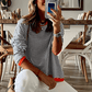 Blau gestreifter Pullover mit orangefarbenem Rand